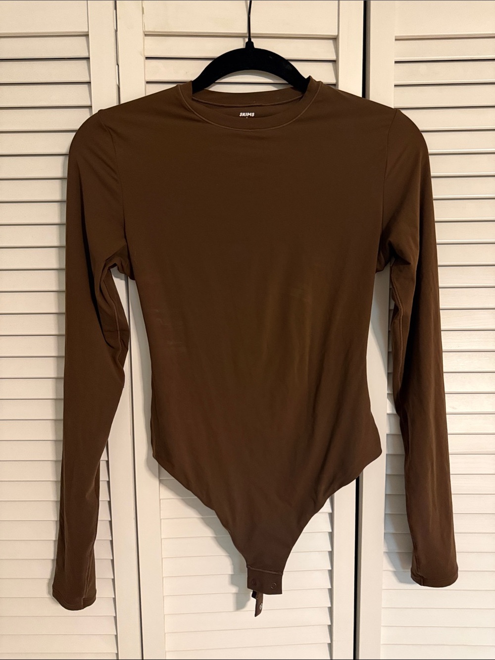 SKIMS Long-Sleeve Crew Neck Bodysuit in Brown